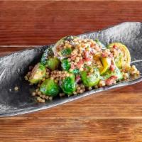 Mediterranean Brussels Sprouts* · pancetta bacon, parmesan, couscous, bell peppers