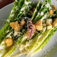 Romaine Hearts Caesar · shaved parmesan, garlic herbed croutons, anchovies, creamy house caesar.