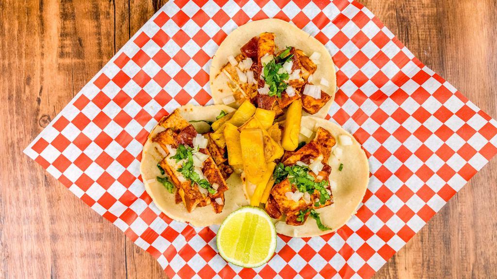 Al Pastor · Mexican Street Tacos Al Pastor Pork with onion, cilantro, grilled pineapple and Mexican salsas.