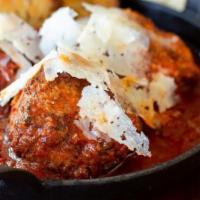 Baked Homemade Meatballs (2 Pieces) · With marinara sauce and mozzarella cheese.