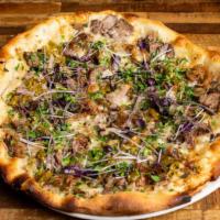Braised Beef Short Rib Pizza · Comte cheese, smoked shishito peppers and shaved bone marrow.