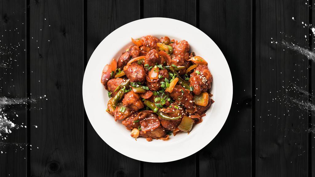 Chili Chicken Chunks · Boneless chicken marinated in Chinese sauces, fried until crispy with stir-fried lots of ginger, garlic and onions.