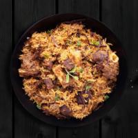 Mighty Mutton Biryani · Pieces of mutton marinated with herbs, Indian spices and cooked with long grain basmati rice...