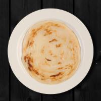 Paratha · Indian flatbread that are crisper and flakier and are traditionally cooked in ghee on an iro...