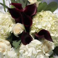 SK009. Elegant Heart · Burgundy mini calla, white hydrangea, white roses, seeded.