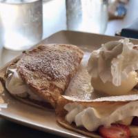 Triple Bee · Three petite crepes filled with strawberry, banana, mango sauce and whipped creme