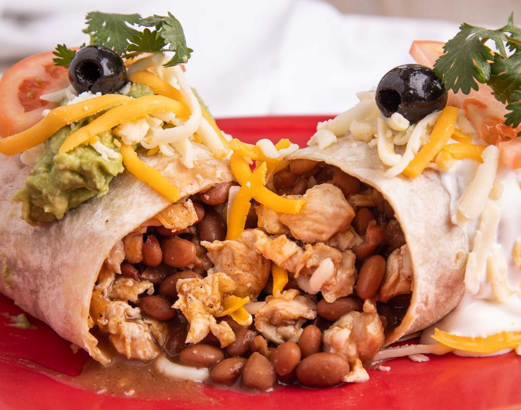 2. Grilled Chicken Burrito (Grande) · Grilled chicken, whole pinto beans, rice, cheese, salsa, sour cream, and guacamole.