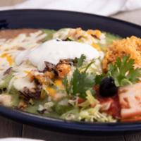 19. Enchiladas de Camaron · Shrimp sautéed with vegetables, two corn tortilla, verde sauce, cheese and sour cream.