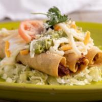 27. Crispy Taquitos (Fried) · Three rolled corn tortilla, sour cream, cheese guacamole.