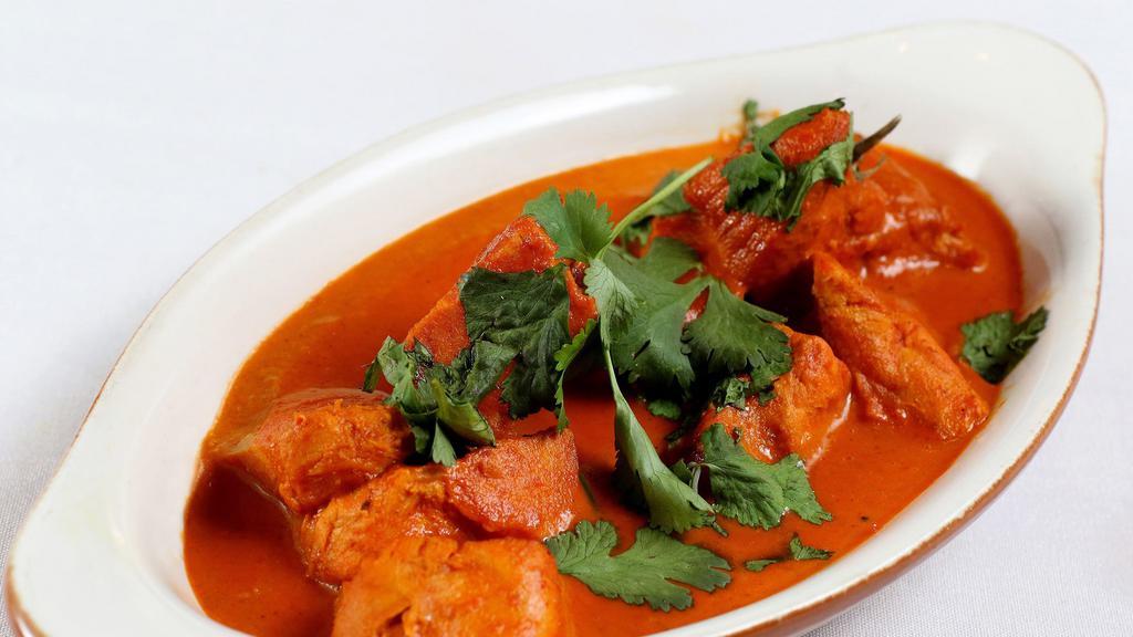 Chicken Tikka Masala · Tender chicken breast roasted in our clay oven, then simmered in a tomato and cream sauce.​