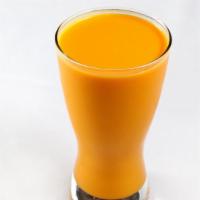 Mango Lassi · A refreshing drink with homemade yogurt and Indian alfanso mango juice.