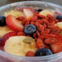 Beach Monkey Bowl · Organic acai with bananas, strawberries, and organic apple juice or almond milk blended. Top...