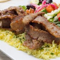 Gyro Plate · Served with rice, choice of meat(chicken or beef), onions, tzatziki sauce, sumac spice, side...