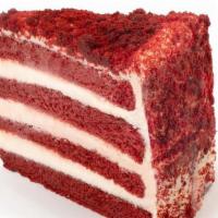 Red Velvet Cake Slice · Delicious red velvet cake filled & decorated with our signature cream cheese frosting