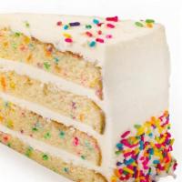 Confetti Cake Slice · Vanilla cake with rainbow sprinkles baked in, filled & iced with velvety vanilla buttercream...