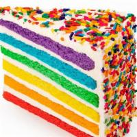 Vanilla Rainbow Cake Slice · Our best seller - six layers of rainbow-colored vanilla cake filled high with a sweet vanill...