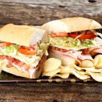 Club Carve · Club Carve is served with smoked bacon, turkey, ham, onions, lettuce, tomatoes, oil, mayo, D...