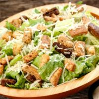 Caesar Salad - Side · The Caesar Salad is served with romaine, parmesan, croutons.