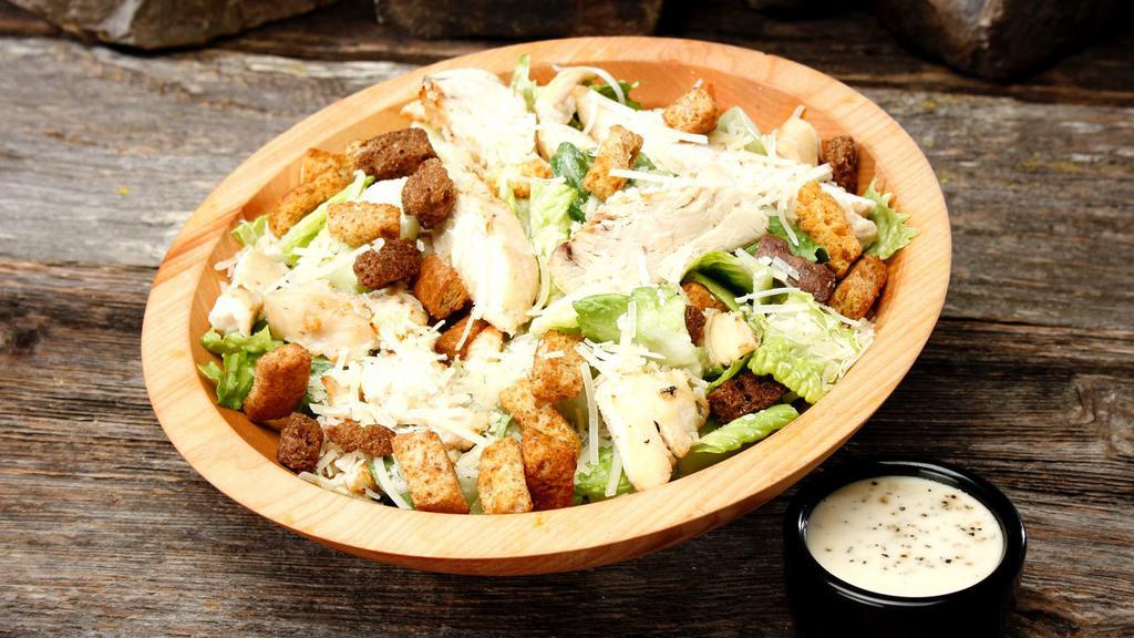 Chicken Caesar Salad - Entree · The Chicken Caesar Salad is served with romaine, parmesan, croutons, grilled chicken.