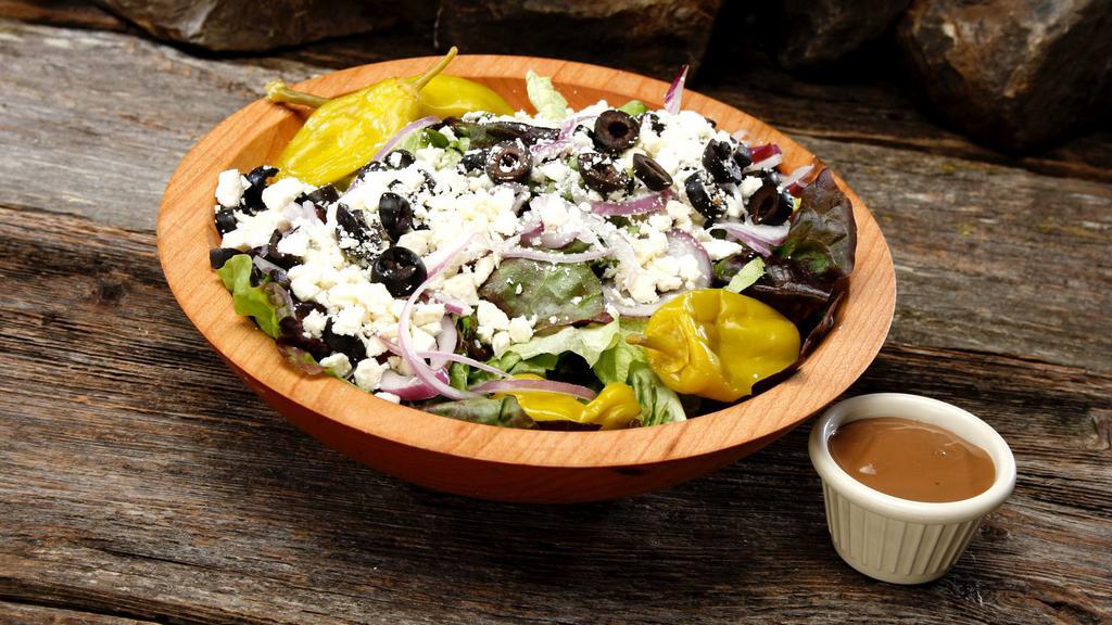 Greek Salad - Entree · The Greek Salad is served with red onions, feta, kalamata olives, pepperoncini, heritage mix.