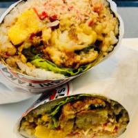 Dragon Burrito · Unagi (BBQ eel), shrimp tempura, tobiko (fish roe), and teriyaki sauce. Served with avocado,...