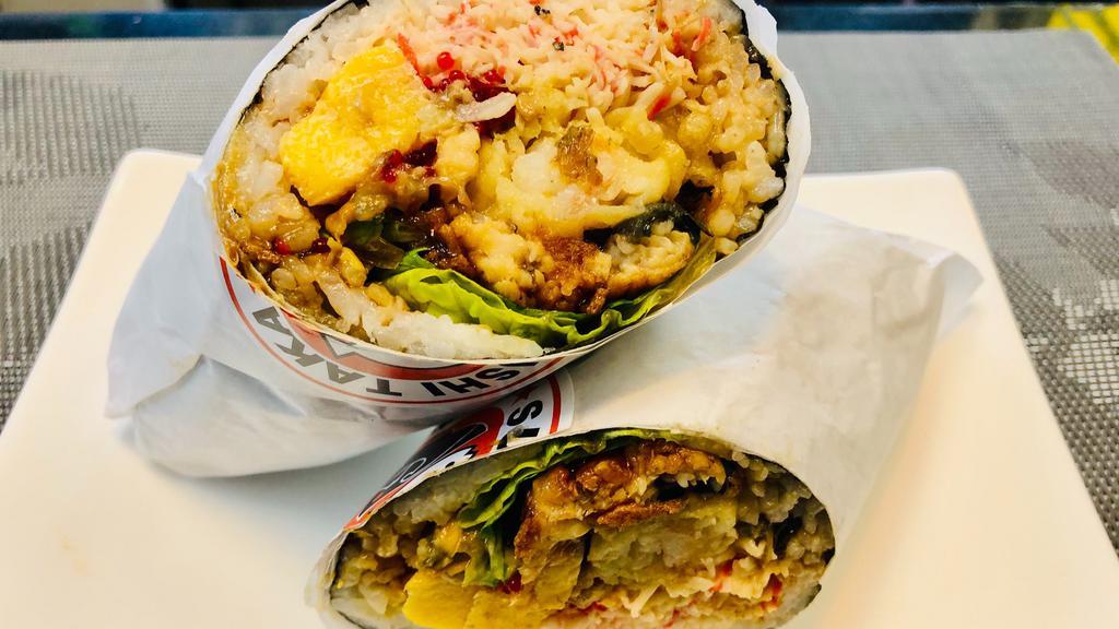 Dragon Burrito · Unagi (BBQ eel), shrimp tempura, tobiko (fish roe), and teriyaki sauce. Served with avocado, romaine lettuce, pickled radish, crab salad, and tamago. Cooked item.