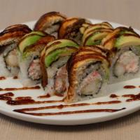 Dragon Roll · Shrimp tempura, crab meat & cucumber topped with eel & avocado.