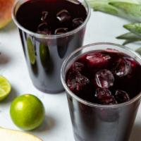 Chicha Morada · Traditional, sweet Peruvian beverage made with purple corn juice and a splash of lime served...
