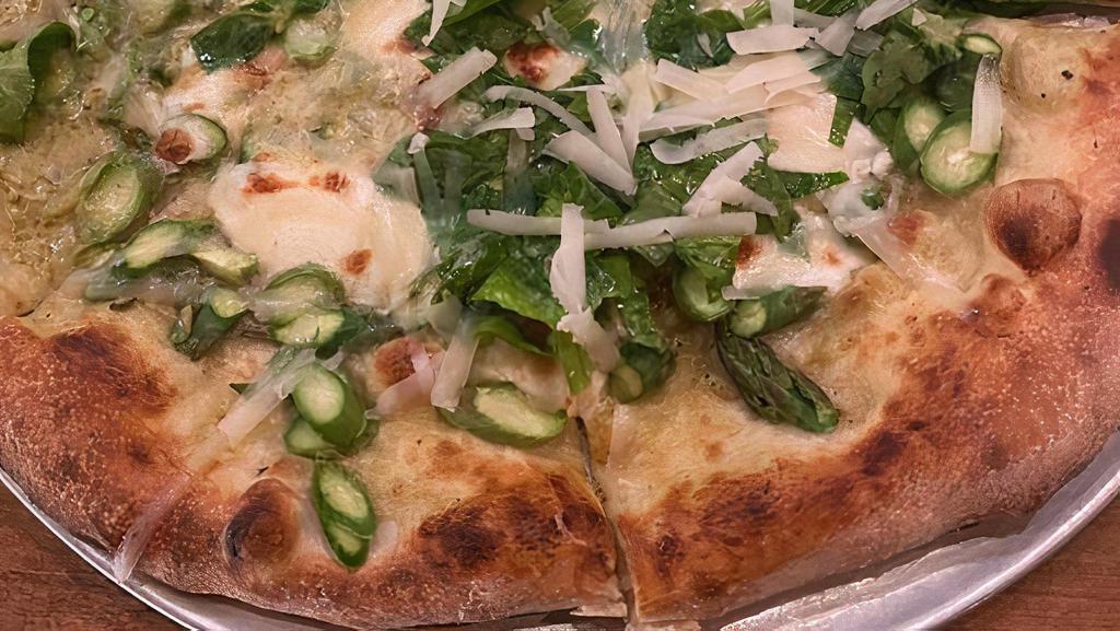 Asparagus Pizza · spring onion-green garlic crema, mozzarella, caciocavallo romano, pea tendrils, agrumato