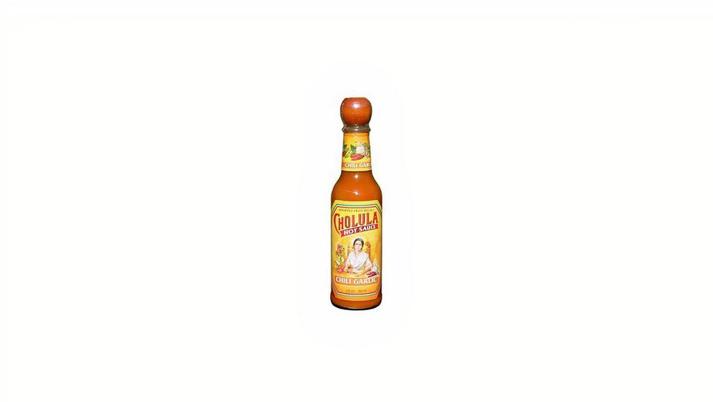 Cholula Hot Sauce - Chili Garlic 5 Oz · The robust flavor of garlic comes alive when paired with our arbol and piquin peppers that are blended with our signature spices.

It’s a natural fit on pasta, soups, ramen, pizza, and more.