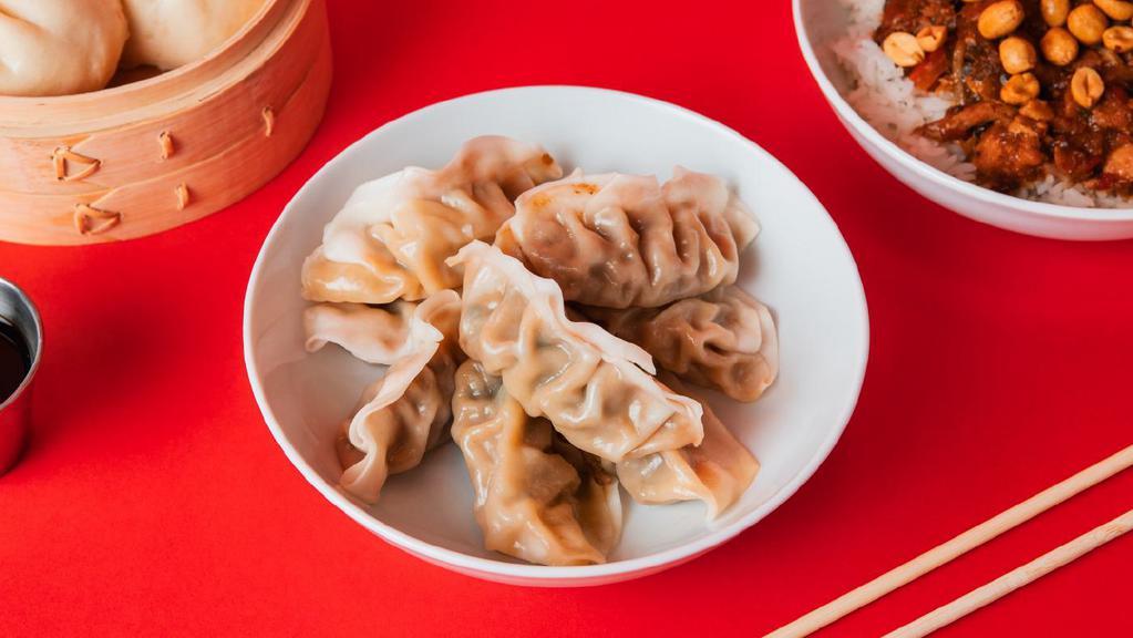 8 Pack Dumplings · Steamed with your choice of filling between Green Vegetable and Ginger Chicken.