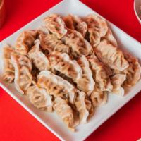 30 Pack Dumplings · Steamed with your choice of filling between Green Vegetable and Ginger Chicken.