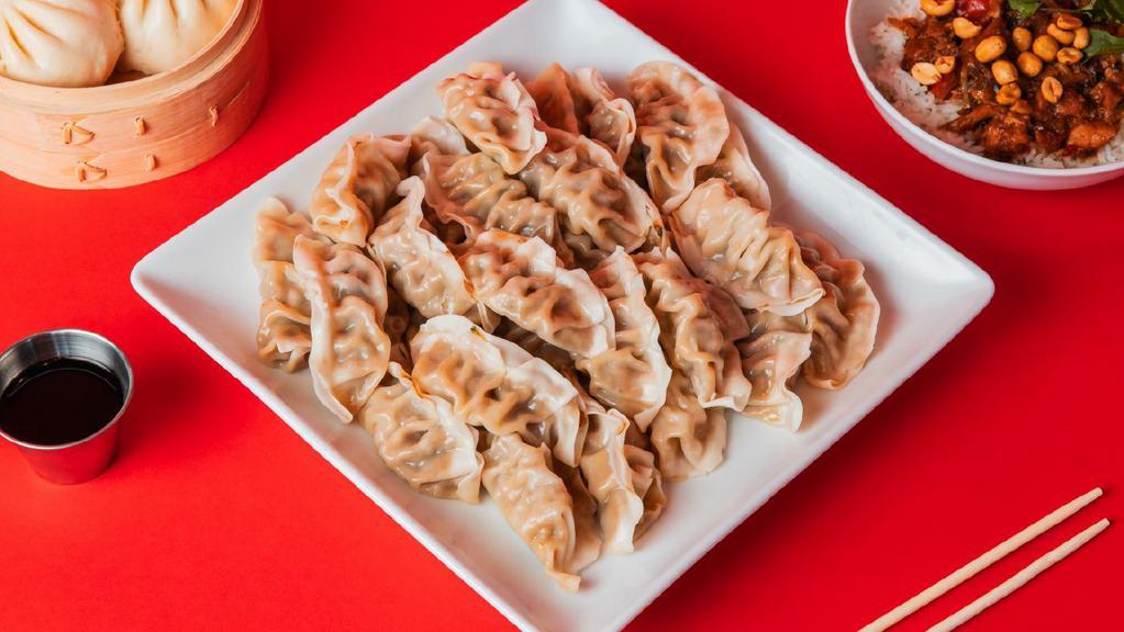 30 Pack Dumplings · Steamed with your choice of filling between Green Vegetable and Ginger Chicken.