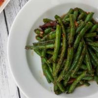 String Beans · Stir fried string beans cooked with garlic, ginger and sweet spicy sauce. Indicate that this...