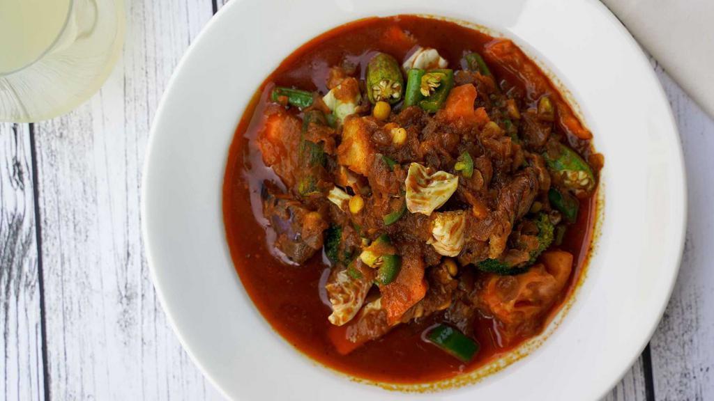 Burmese Style Mix Vegetables · Burmese curry sauce with tomatoes, okra, eggplant, yellow beans, carrots, potatoes, cabbage, lentil and tofu. Indicate that this item can be made gluten free.