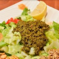 Tea Leaf Salad & Rice · Traditionally prepared Burmese food, salad mixed with cabbage, fried garlic, yellow split pe...