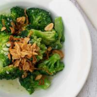 Garlic Broccoli · Broccoli tossed in a wok with garlic, topped with fried garlic and fried onions. Indicate th...