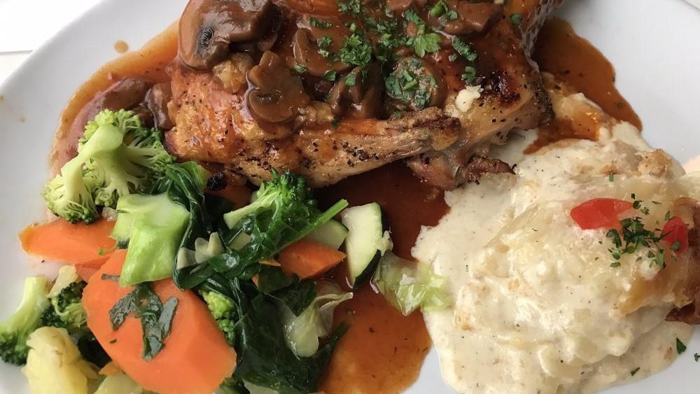 Poulet Chalet Basque · Roasted half chicken
Served with sautéed mixed vegetables & potatoes au gratin