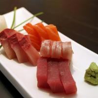 Sashimi Sampler · 3 pcs of tuna, salmon, hamachi, and tai.