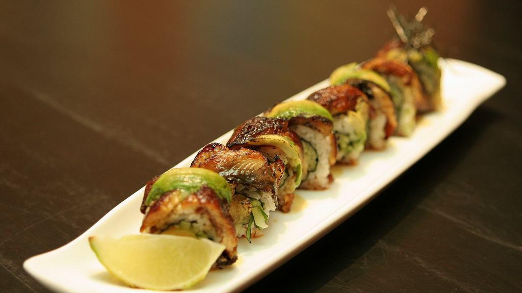 Dragon Roll · Shrimp tempura, cucumber,crab meat  roll w/ avocado, unagi & unagi sauce.