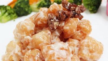 Honey Glazed Walnut Prawn · Fresh prawn marinated in Chef's sauce with sesame seeds and walnut.