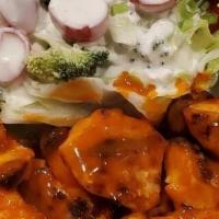 Buffalo Skewers (formerly Buffalo Wings) · Two Skewers of Mary's Chicken breast marinated in Buffalo sauce, Iceberg wedge with Tomatoes...