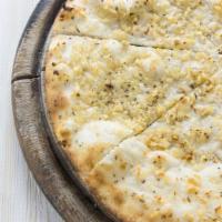 Garlic Hummus Vegan Pizza · Creamy hummus, choppd garlic, daiya cheese, green peppers, mushrooms, red onions, and house ...