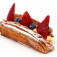 Danish Fruit Boat 丹麥水果船 · Custard filling at the bottom, lined with strawberries and blueberries, and finishes with po...