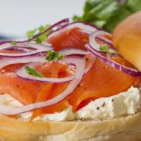 A Taste of New York · Toasted bagel with lox, cream cheese, sliced tomato and onions.
