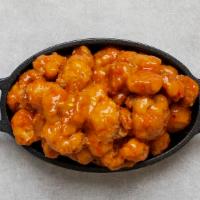 Mango Habanero Cauliflower Bites · Served with celery or carrots, and blue cheese or ranch.