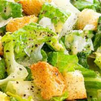 Caesar Salad · Romaine lettuce with caesar dressing, parmesan cheese, and croutons