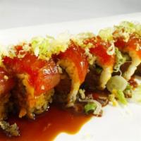 03. Omg Roll · Spicy tuna topped with fresh tuna and house so spicy sauce.