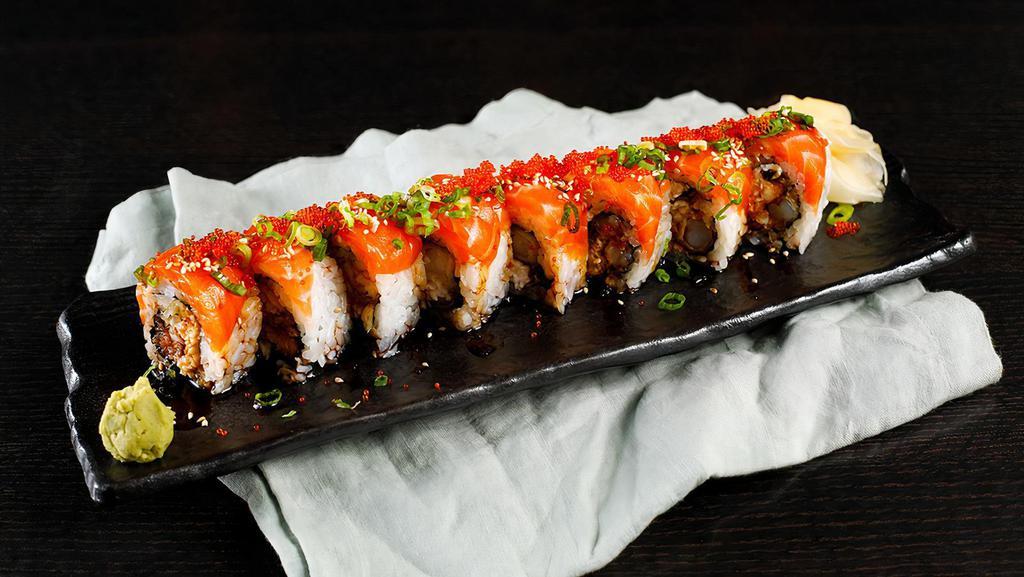40. Golden Gate Roll · Crab, eel, shrimp tempura topped salmon, tobiko and house sauce.