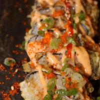 04. Try Me Roll · Fried unagi and crabmeat topped with seared tuna, avocado, spicy tuna, tobiko, scallion and ...